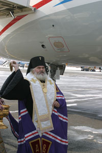 Освящение авиалайнера А-520