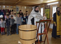 В Партизанске приняли Таинство крещения 20 детей из Детского дома