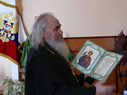 фото, награждение А. Ролика орденом св. мч. Трифона III степени